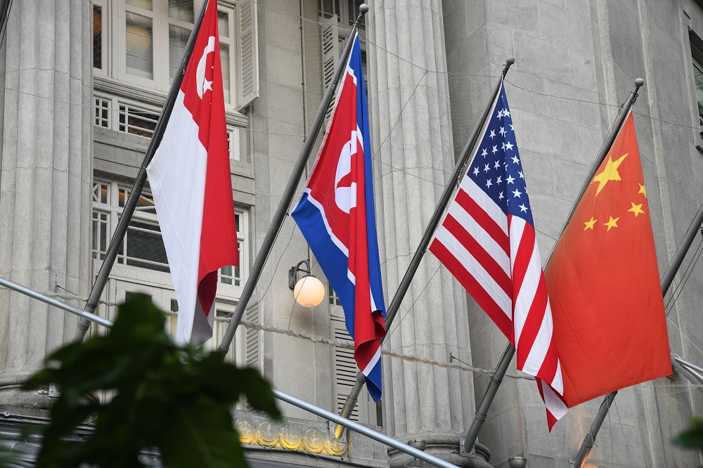 Foto Pertemuan Bersejarah Trump dengan Kim Jong-un