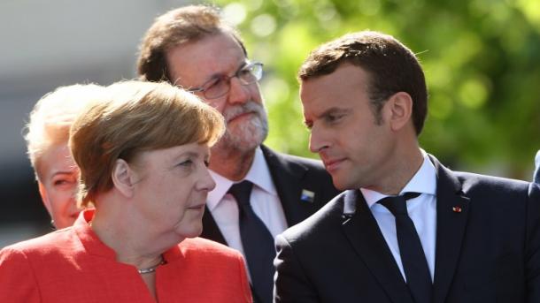 merkel rajoy macron