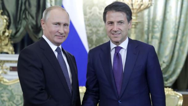 Владимир Путин обсудил ситуацию в Ливии с председателем Совета министров Италии