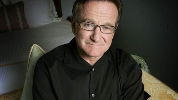 Robin Williamsın həyat yoldaşı və üç uşağı qarşı-qarşıya