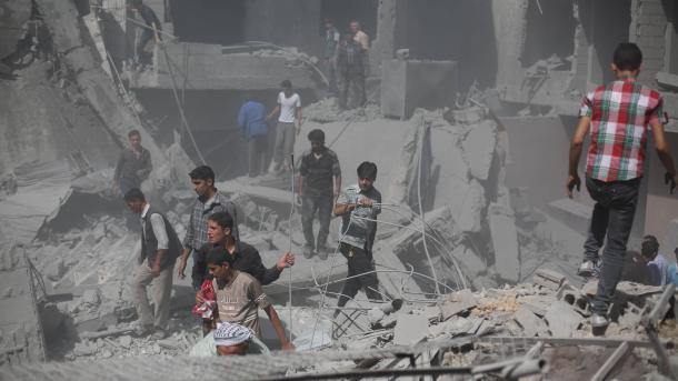 اسد قوتوں کی گھوٹا پر بمباری، 247 افراد ہلاک 