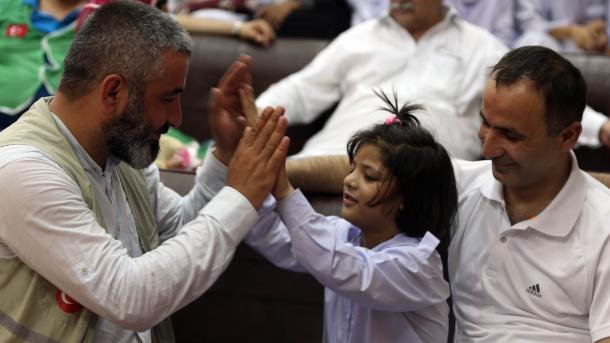 İHH ھەيئىتى پاكىستانغا بېرىپ، قىز يېتىم - يېسىلارنى يوقلىدى