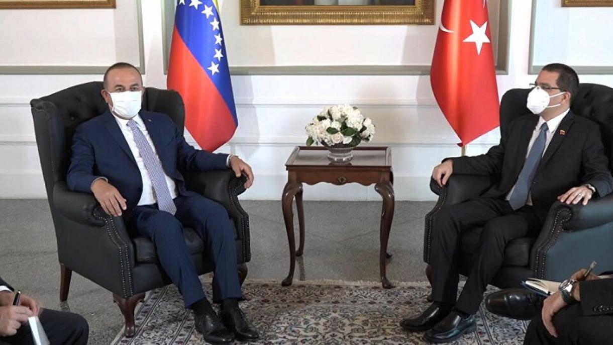 Mevlüt Çavuşoğlu Venezuela'da - Jorge Arreaza 03.jpg