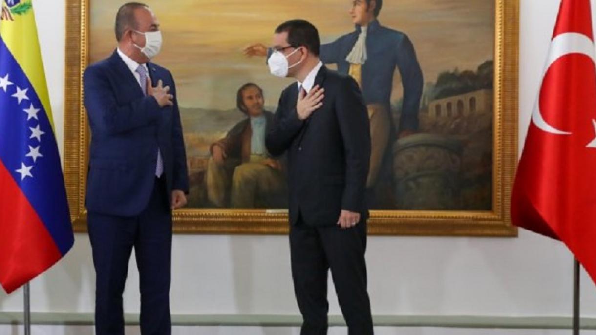 Mevlüt Çavuşoğlu Venezuela'da - Jorge Arreaza 02.jpg