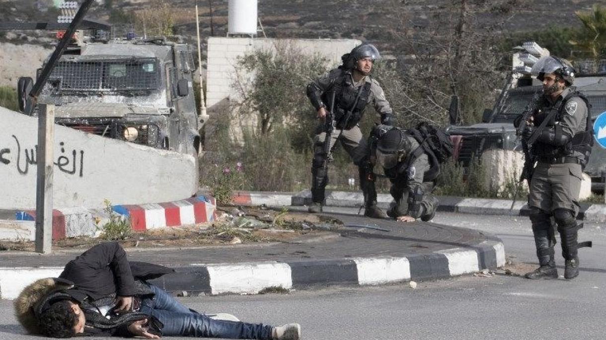 اسرائیل پولیسی جانلی نشرات جریانیده فلسطین لیک بیر کیشینی آتیب تشله دی
