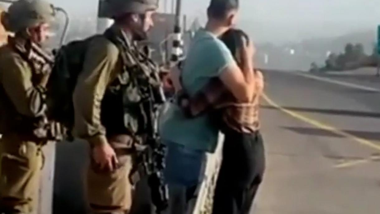لحظه وداع یک فلسطینی با همسرش قبل از دستگیری توسط نیروهای اسرائیلی