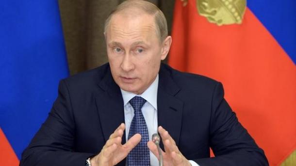 Vladimir Putin vəzifəsindən sui-istifadə etməkdə ittiham edilib