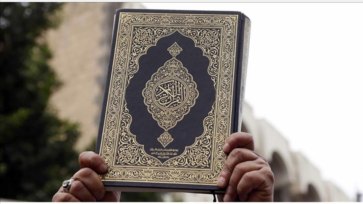 "یہ قرآن ہے اسے کوئی آگ نہیں لگا سکتا" ایک عورت قرآن کے سامنے ڈھال بن گئی