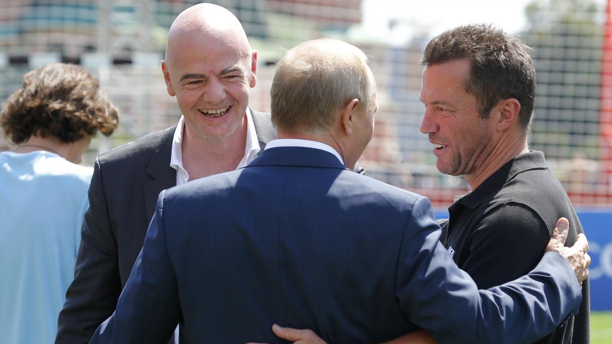 2018-06-28T102010Z_1110048013_UP1EE6S0SPLXH_RTRMADP_3_SOCCER-WORLDCUP-PUTIN-INFANTINO.JPG