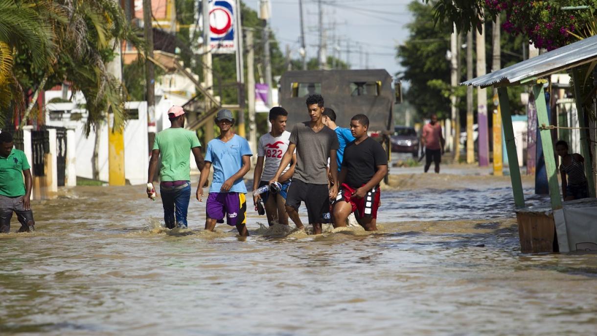 多米尼加强降雨引发洪水21人死亡