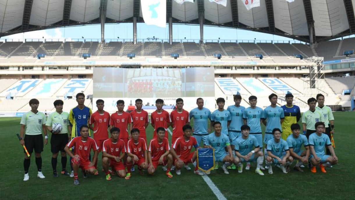 Trabalhadores da Coreia do Norte e do Sul se reúnem pelo futebol