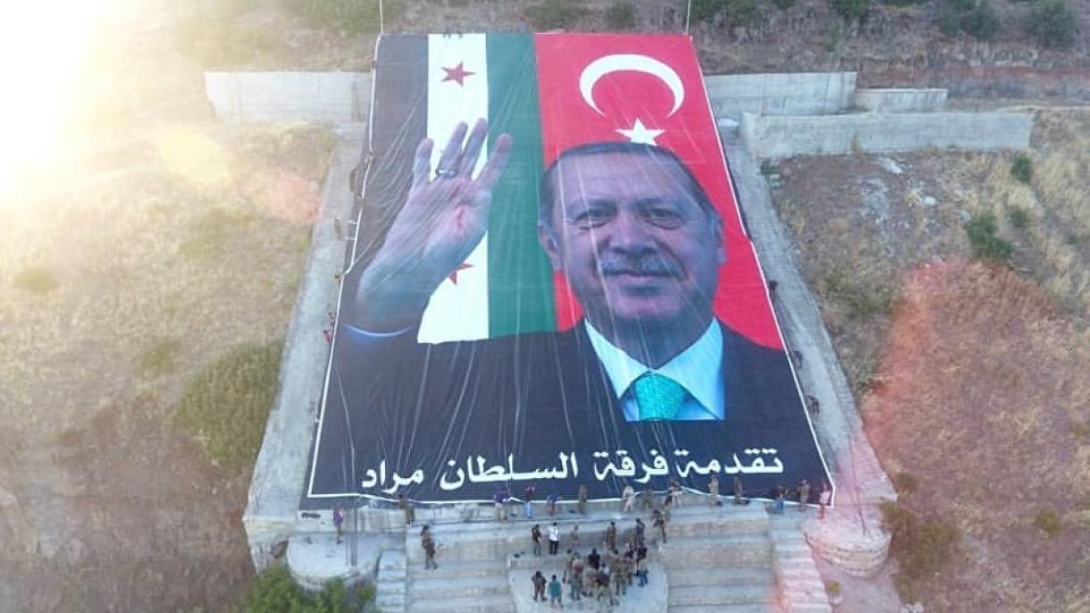 نصب عکس اردوغان بر کوه دارمیک عفرین