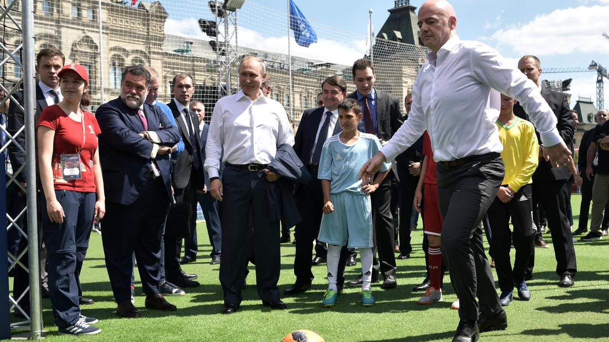 2018-06-28T111929Z_1948471926_RC167E490E20_RTRMADP_3_SOCCER-WORLDCUP-PUTIN-INFANTINO.JPG